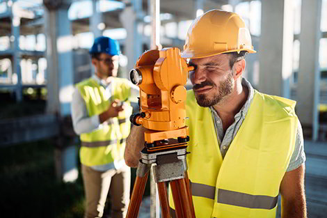 terra-geodezja-picture-of-construction-engineer-working-on-building-site-a